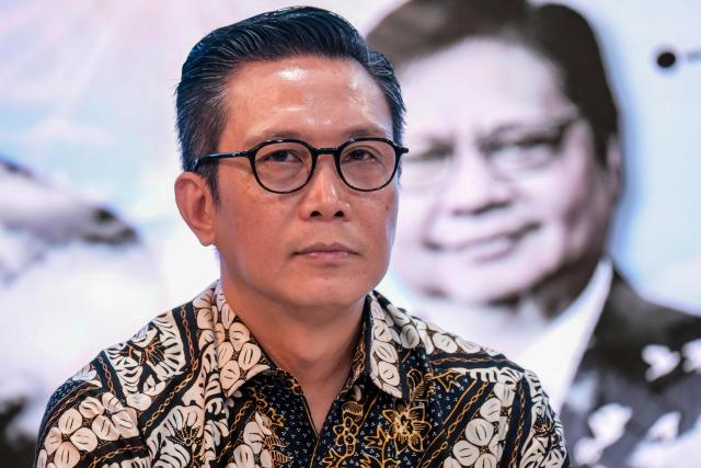Indonesia Stock Exchange Director Jeffrey Hendrik attends a press conference at the Indonesia Stock Exchange in Jakarta on February 9, 2026. (Photo by BAY ISMOYO / AFP)