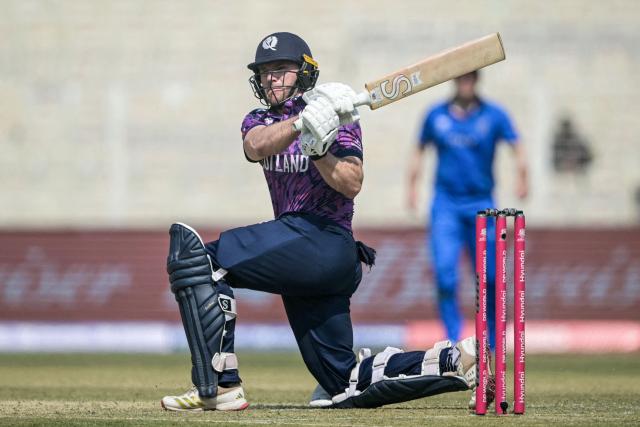 Scotland's captain Richie Berrington plays a shot during the 2026 ICC Men's T20 Cricket World Cup group stage match between Scotland and Italy at the Eden Gardens in Kolkata on February 9, 2026. (Photo by Dibyangshu SARKAR / AFP)