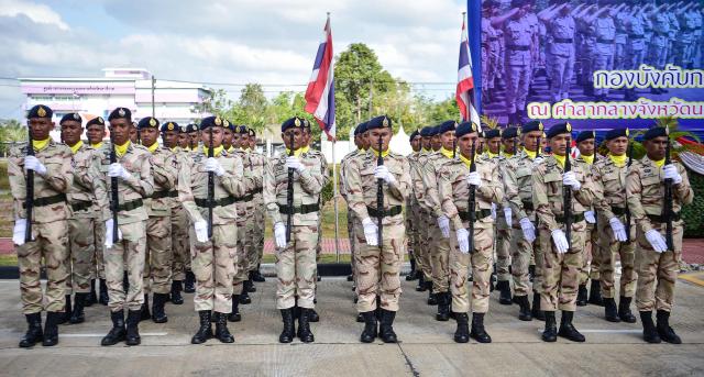 Thai civilian defence volunteers take part in a parade on the eve of the annual Defence Volunteers Day in Narathiwat, southern Thailand on February 9, 2026. (Photo by Madaree TOHLALA / AFP)