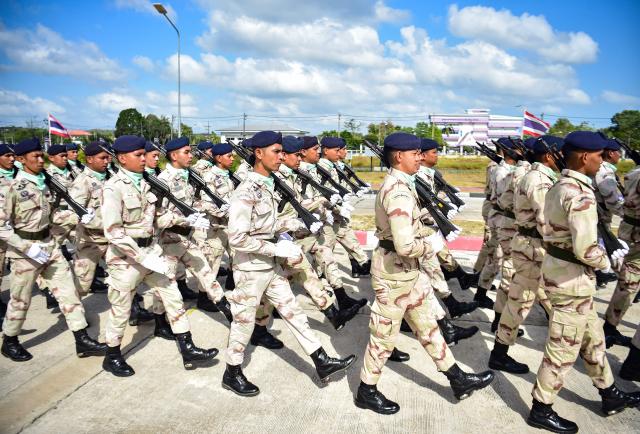 Thai civilian defence volunteers take part in a parade on the eve of the annual Defence Volunteers Day in Narathiwat, southern Thailand on February 9, 2026. (Photo by Madaree TOHLALA / AFP)