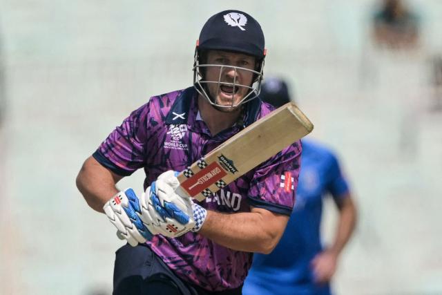 Scotland's George Munsey reacts after playing a shot during the 2026 ICC Men's T20 Cricket World Cup group stage match between Scotland and Italy at the Eden Gardens in Kolkata on February 9, 2026. (Photo by Dibyangshu SARKAR / AFP)