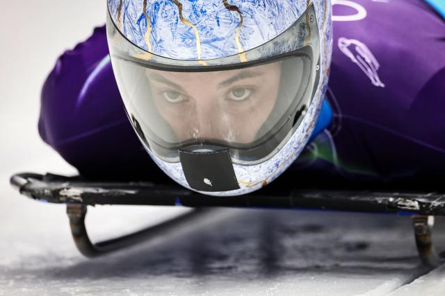 Italy's Alessandra Fumagalli takes part in the skeleton women's training session at Cortina Sliding Centre during the Milano Cortina 2026 Winter Olympic Games in Cortina d'Ampezzo on February 9, 2026. (Photo by FRANCK FIFE / AFP)