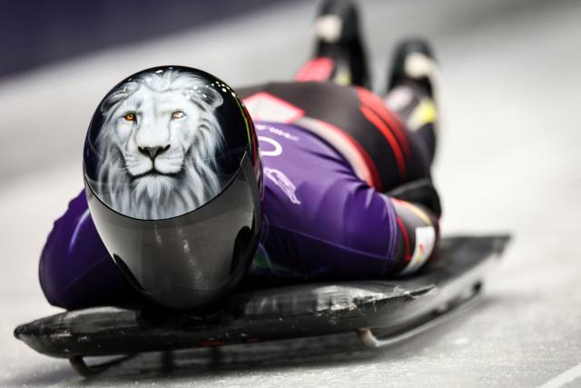 Belgium's Kim Meylemans takes part in the skeleton women's training session at Cortina Sliding Centre during the Milano Cortina 2026 Winter Olympic Games in Cortina d'Ampezzo on February 9, 2026. (Photo by FRANCK FIFE / AFP)