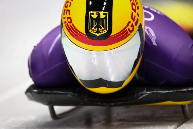 Germany's Jacqueline Pfeifer takes part in the skeleton women's training session at Cortina Sliding Centre during the Milano Cortina 2026 Winter Olympic Games in Cortina d'Ampezzo on February 9, 2026. (Photo by FRANCK FIFE / AFP)