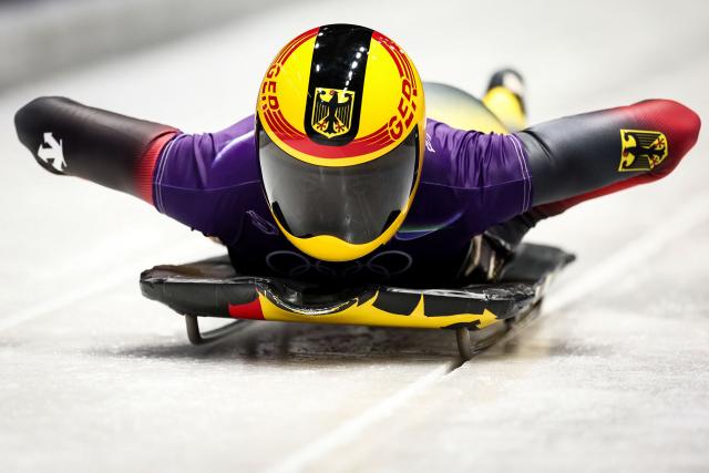 Germany's Susanne Kreher takes part in the skeleton women's training session at Cortina Sliding Centre during the Milano Cortina 2026 Winter Olympic Games in Cortina d'Ampezzo on February 9, 2026. (Photo by FRANCK FIFE / AFP)