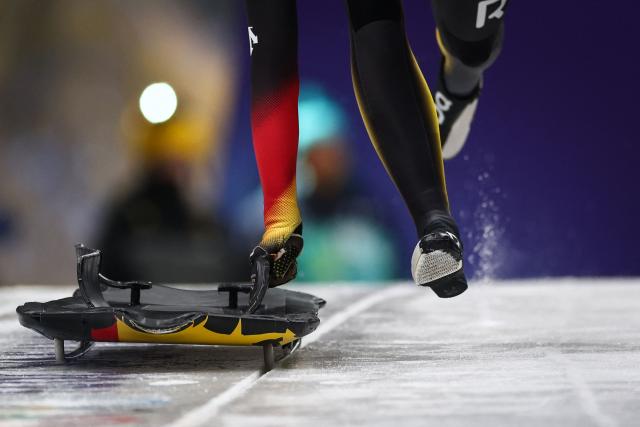 Germany's Susanne Kreher takes part in the skeleton women's training session at Cortina Sliding Centre during the Milano Cortina 2026 Winter Olympic Games in Cortina d'Ampezzo on February 9, 2026. (Photo by FRANCK FIFE / AFP)
