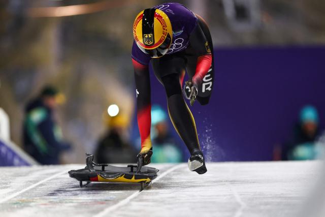 Germany's Susanne Kreher takes part in the skeleton women's training session at Cortina Sliding Centre during the Milano Cortina 2026 Winter Olympic Games in Cortina d'Ampezzo on February 9, 2026. (Photo by FRANCK FIFE / AFP)