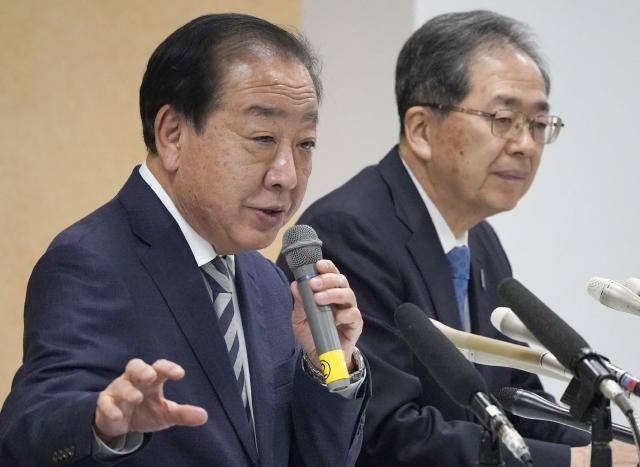 Co-leaders of the opposition party Centrist Reform Alliance, Yoshihiko Noda (L) and Tetsuo Saito hold a press conference the day after the House of Representatives election at the party's headquaters in Tokyo on February 9, 2026. Japanese shares rose to record highs on February 9 after Prime Minister Sanae Takaichi's conservatives won a historic election landslide with a projected two-thirds majority. (Photo by JIJI Press / AFP) / Japan OUT