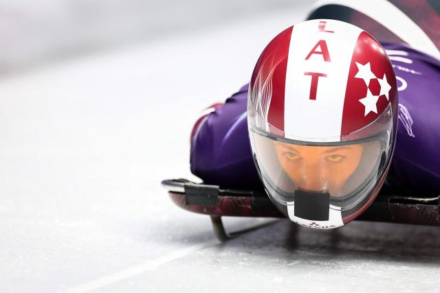 Latvia's Marta Andzane takes part in the skeleton women's training session at Cortina Sliding Centre during the Milano Cortina 2026 Winter Olympic Games in Cortina d'Ampezzo on February 9, 2026. (Photo by FRANCK FIFE / AFP)
