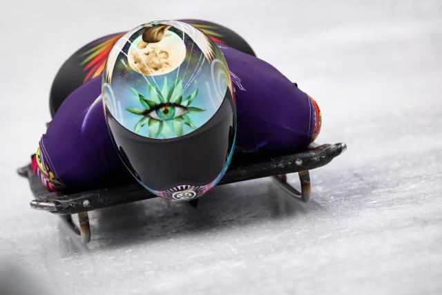 Puerto Rico's Kellie Delka takes part in the skeleton women's training session at Cortina Sliding Centre during the Milano Cortina 2026 Winter Olympic Games in Cortina d'Ampezzo on February 9, 2026. (Photo by FRANCK FIFE / AFP)