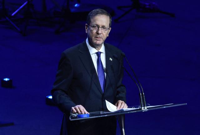 Israeli President Isaac Herzog delivers a speech as he participates in an event titled 'An Evening of Light & Solidarity' for the victims of the December 14, 2025 gun attack in Sydney on February 9, 2026. Herzog said February 9 people of all faiths will "overcome this evil" as he paid respect to victims of a shooting that killed 15 people celebrating a Jewish festival on Sydney's Bondi Beach. (Photo by DAVID GRAY / AFP)