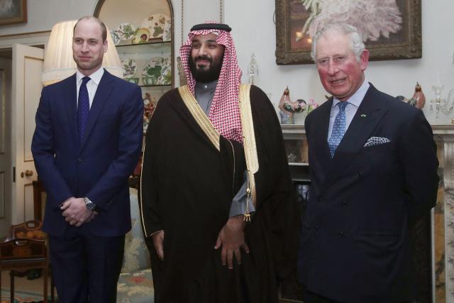 (FILES) Britain's then-Prince Charles, Prince of Wales (R) and Britain's Prince William (L) meet with Saudi Arabia's Crown Prince Mohammed bin Salman (C) for dinner at Clarence House in central London on March 7, 2018. Prince William will begin his first official visit to Saudi Arabia with a meeting on February 9, 2026 with host Crown Prince Mohammed bin Salman, as London seeks to deepen economic cooperation with the Gulf nation. (Photo by Yui Mok / POOL / AFP)
