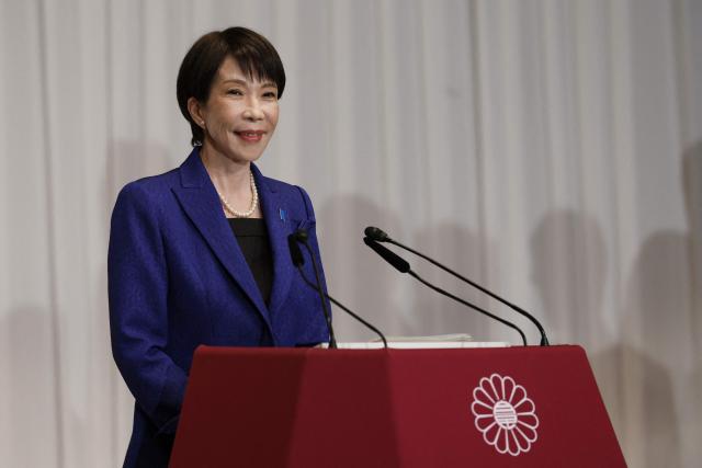 Japan's Prime Minister Sanae Takaichi, leader of the ruling Liberal Democratic Party (LDP), speaks during a press conference at the LDP headquarters in Tokyo on February 9, 2026. Japanese Prime Minister Sanae Takaichi said on February 9 she felt a "heavy responsibility" to make the country stronger and more prosperous after winning a landslide election victory. (Photo by Franck ROBICHON / POOL / AFP)
