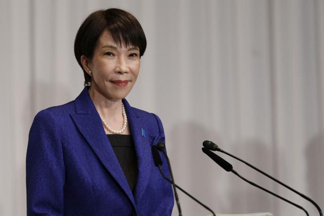 Japan's Prime Minister Sanae Takaichi, leader of the ruling Liberal Democratic Party (LDP), speaks during a press conference at the LDP headquarters in Tokyo on February 9, 2026. Japanese Prime Minister Sanae Takaichi said on February 9 she felt a "heavy responsibility" to make the country stronger and more prosperous after winning a landslide election victory. (Photo by Franck ROBICHON / POOL / AFP)