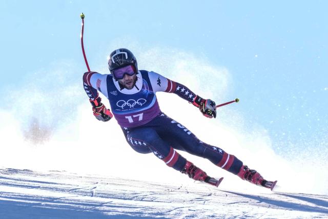 US' Kyle Negomir competes in the downhill run of the men's team combined alpine skiing event during the Milano Cortina 2026 Winter Olympic Games at the Stelvio Ski Centre in Bormio (Valtellina) on February 9, 2026. (Photo by Dimitar DILKOFF / AFP)