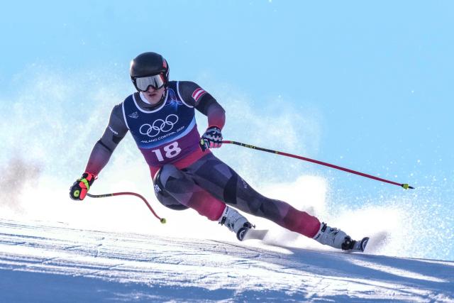Austria's Stefan Babinsky competes in the downhill run of the men's team combined alpine skiing event during the Milano Cortina 2026 Winter Olympic Games at the Stelvio Ski Centre in Bormio (Valtellina) on February 9, 2026. (Photo by Dimitar DILKOFF / AFP)