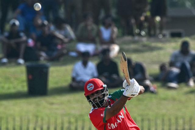 Oman's Vinayak Shukla plays a shot during the 2026 ICC Men's T20 Cricket World Cup group stage match between Zimbabwe and Oman at the Sinhalese Sports Club Ground in Colombo on February 9, 2026. (Photo by Ishara S. KODIKARA / AFP)