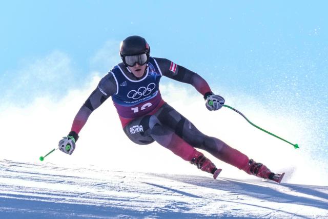 Austria's Raphael Haaser competes in the downhill run of the men's team combined alpine skiing event during the Milano Cortina 2026 Winter Olympic Games at the Stelvio Ski Centre in Bormio (Valtellina) on February 9, 2026. (Photo by Dimitar DILKOFF / AFP)