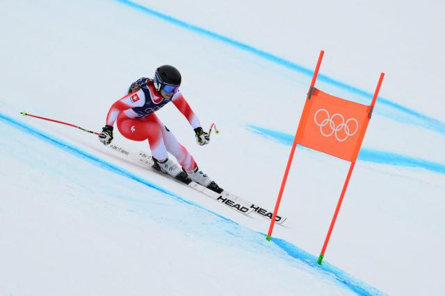 Switzerland's Delia Durrer takes part in the official training for the downhill run of the women's team combined event during the Milano Cortina 2026 Winter Olympic Games at the Tofane Alpine Skiing Centre in Cortina d’Ampezzo on February 9, 2026. (Photo by Marco BERTORELLO / AFP)
