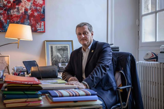 Mayor of Perpignan and Vice President of the far-right party Rassemblement National (RN) Louis Aliot poses for a photo at his office in Perpinan on February 6, 2025. (Photo by Ed JONES / AFP)