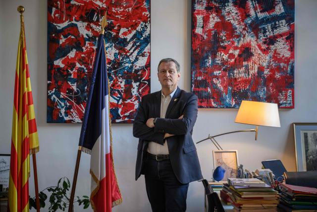 Mayor of Perpignan and Vice President of the far-right party Rassemblement National (RN) Louis Aliot poses for a photo at his office in Perpinan on February 6, 2025. (Photo by Ed JONES / AFP)