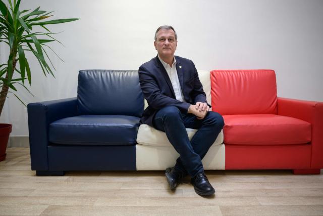 Mayor of Perpignan and Vice President of the far-right party Rassemblement National (RN) Louis Aliot poses for a photo at his office in Perpinan on February 6, 2025. (Photo by Ed JONES / AFP)