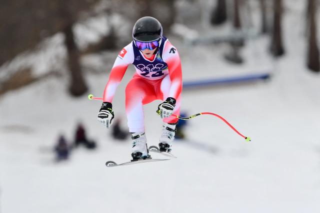 Switzerland's Delia Durrer takes part in the official training for the downhill run of the women's team combined event during the Milano Cortina 2026 Winter Olympic Games at the Tofane Alpine Skiing Centre in Cortina d’Ampezzo on February 9, 2026. (Photo by Stefano RELLANDINI / AFP)