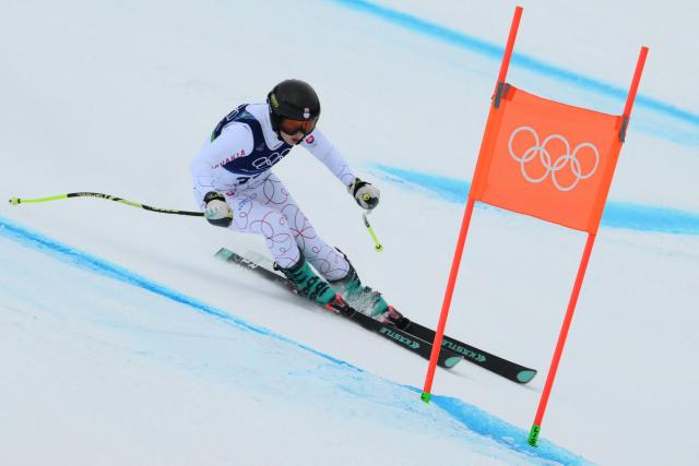 Slovakia's Rebeka Jancova takes part in the official training for the downhill run of the women's team combined event during the Milano Cortina 2026 Winter Olympic Games at the Tofane Alpine Skiing Centre in Cortina d’Ampezzo on February 9, 2026. (Photo by Marco BERTORELLO / AFP)
