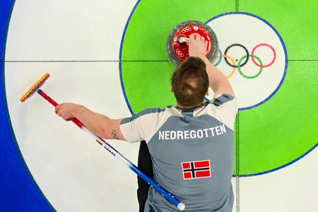 Norway's Magnus Nedregotten competes in the curling mixed doubles round robin between Norway and South Korea during the Milano Cortina 2026 Winter Olympic Games at the Cortina Curling Olympic Stadium in Cortina d’Ampezzo on February 9, 2026. (Photo by Odd ANDERSEN / AFP)