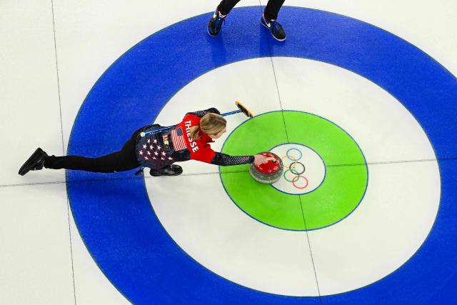 US' Cory Thiesse competes in the curling mixed doubles round robin between USA and Italy during the Milano Cortina 2026 Winter Olympic Games at the Cortina Curling Olympic Stadium in Cortina d’Ampezzo on February 9, 2026. (Photo by Odd ANDERSEN / AFP)
