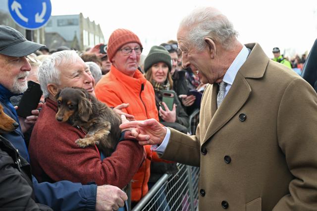 Britain's King Charles III chats with members of the public outside Clitheroe Station during a visit to the town of Clitheroe, northern England on February 9, 2026. (Photo by Paul ELLIS / POOL / AFP)