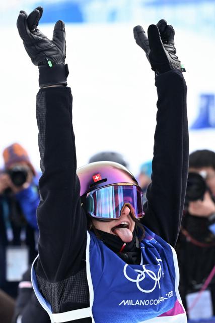 Switzerland's Mathilde Gremaud celebrates after competing in the freestyle skiing women's freeski slopestyle final run 2 during the Milano Cortina 2026 Winter Olympic Games at Livigno Snow Park-Slopestyle, in Livigno (Valtellina), on February 9, 2026. (Photo by Kirill KUDRYAVTSEV / AFP)