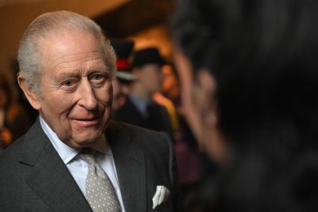 Britain's King Charles III meets guests during a visit to the 700-year-old medieval manor Samlesbury Hall in Preston, north-west England on February 9, 2026. (Photo by Paul ELLIS / POOL / AFP)