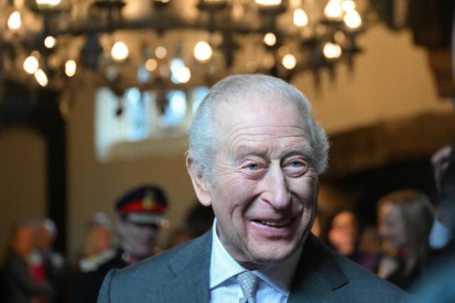 Britain's King Charles III meets guests during a visit to the 700-year-old medieval manor Samlesbury Hall in Preston, north-west England on February 9, 2026. (Photo by Paul ELLIS / POOL / AFP)