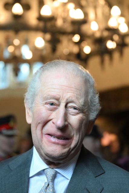 Britain's King Charles III meets guests during a visit to the 700-year-old medieval manor Samlesbury Hall in Preston, north-west England on February 9, 2026. (Photo by Paul ELLIS / POOL / AFP)