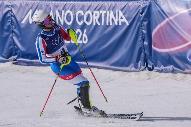France's Paco Rassat reacts in the finish area after competing in the slalom run of the men's team combined alpine skiing event during the Milano Cortina 2026 Winter Olympic Games at the Stelvio Ski Centre in Bormio (Valtellina) on February 9, 2026. (Photo by Dimitar DILKOFF / AFP)