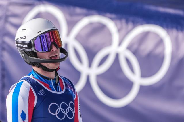 France's Paco Rassat reacts in the finish area after competing in the slalom run of the men's team combined alpine skiing event during the Milano Cortina 2026 Winter Olympic Games at the Stelvio Ski Centre in Bormio (Valtellina) on February 9, 2026. (Photo by Dimitar DILKOFF / AFP)