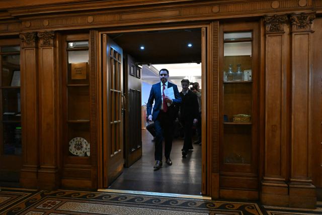 Scottish Labour leader Anas Sarwar leaves after speaking at a press conference in Glasgow on February 9, 2026, at which he called for Britain's Prime Minister Keir Starmer to resign. Keir Starmer's position as UK prime minister looked increasingly fragile Monday after Labour's leader in Scotland called for him to resign for appointing Peter Mandelson as US ambassador despite links to US convicted sex offender Jeffrey Epstein.  "The distraction needs to end, and the leadership in Downing Street has to change," Anas Sarwar told a press conference in Glasgow, as Starmer's decision on Mandelson continues to haunt him. (Photo by ANDY BUCHANAN / AFP)