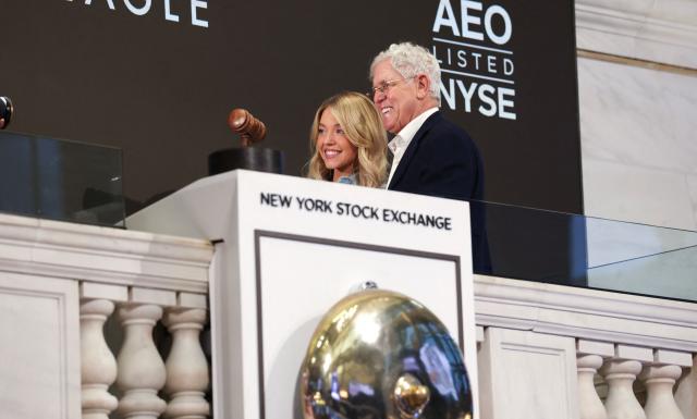 (L/R) US actress Sydney Sweeney and American Eagle CEO Jay L. Schottenstein stand together after ringing the opening bell at the New York Stock Exchange to celebrate the American Eagle brand on February 9, 2026, in New York. (Photo by TIMOTHY A. CLARY / AFP)