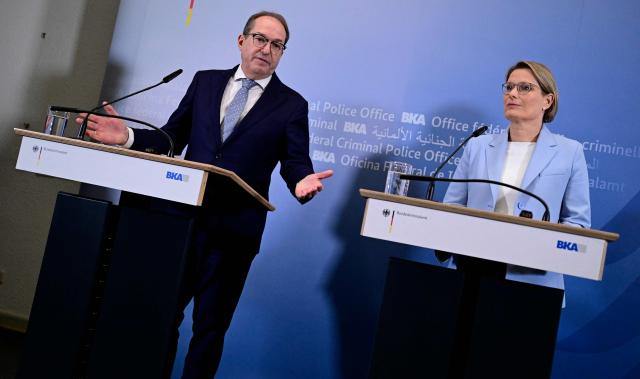 German Interior Minister Alexander Dobrindt and German Minister for Justice and Consumer Protection Stefanie Hubig addresses a press conference as they visit the Joint Counter-Terrorism Center (GTAZ) in Berlin on February 9, 2026. (Photo by John MACDOUGALL / AFP)