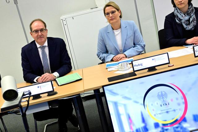 German Interior Minister Alexander Dobrindt (L) and German Minister for Justice and Consumer Protection Stefanie Hubig attend a meeting as they visit the Joint Counter-Terrorism Center (GTAZ) in Berlin on February 9, 2026. (Photo by John MACDOUGALL / AFP)
