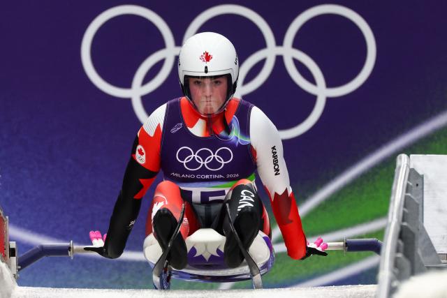 Canada's Embyr-Lee Susko takes the start to compete in the luge women's singles run 1 at Cortina Sliding Centre during the Milano Cortina 2026 Winter Olympic Games in Cortina d'Ampezzo on February 9, 2026. (Photo by FRANCK FIFE / AFP)