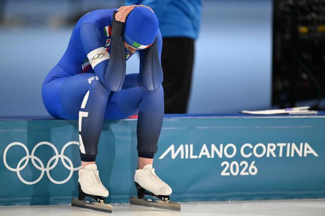 Italy's Maybritt Vigl reacts after competing in the speed skating women's 1000m during the Milano Cortina 2026 Winter Olympic Games at Milano Speed Skating Stadium in Milan on February 9, 2026. (Photo by Daniel MUNOZ / AFP)