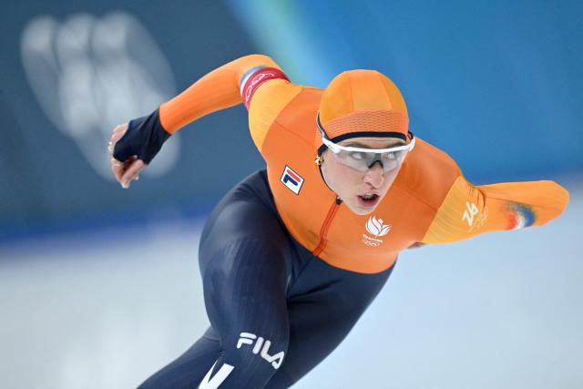 Netherlands' Suzanne Schulting competes in the speed skating women's 1000m during the Milano Cortina 2026 Winter Olympic Games at Milano Speed Skating Stadium in Milan on February 9, 2026. (Photo by WANG Zhao / AFP)