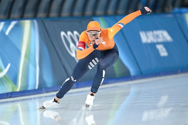 Netherlands' Suzanne Schulting competes in the speed skating women's 1000m during the Milano Cortina 2026 Winter Olympic Games at Milano Speed Skating Stadium in Milan on February 9, 2026. (Photo by WANG Zhao / AFP)