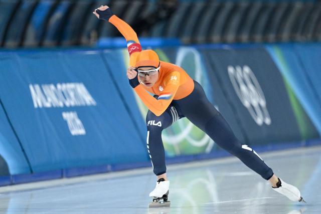 Netherlands' Suzanne Schulting competes in the speed skating women's 1000m during the Milano Cortina 2026 Winter Olympic Games at Milano Speed Skating Stadium in Milan on February 9, 2026. (Photo by WANG Zhao / AFP)