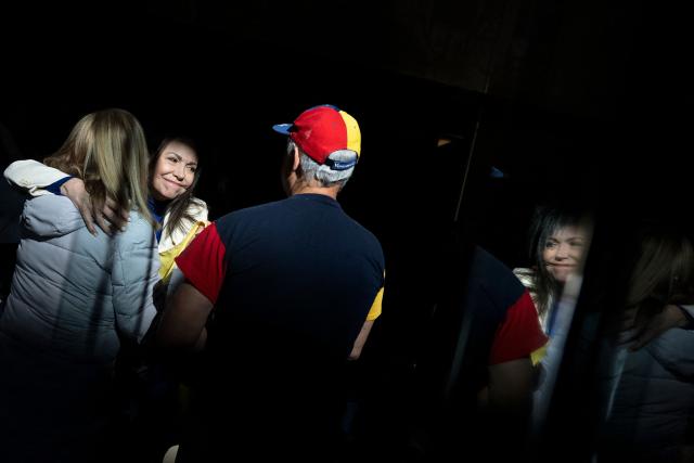 Venezuelan opposition leader Maria Corina Machado greets supporters after a meeting with the Inter-American Commission on Human Rights (IACHR) at the Organization of American States (OAS) in Washington, DC, on February 9, 2026. (Photo by Brendan Smialowski / AFP)