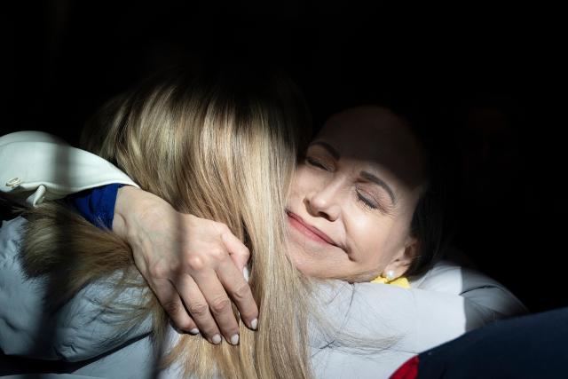 Venezuelan opposition leader Maria Corina Machado greets supporters after a meeting with the Inter-American Commission on Human Rights (IACHR) at the Organization of American States (OAS) in Washington, DC, on February 9, 2026. (Photo by Brendan Smialowski / AFP)