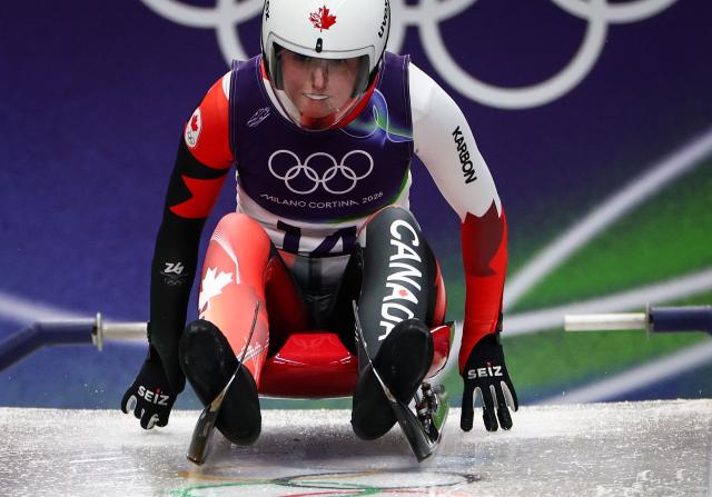 Canada's Trinity Ellis takes the start to compete in the luge women's singles run 1 at Cortina Sliding Centre during the Milano Cortina 2026 Winter Olympic Games in Cortina d'Ampezzo on February 9, 2026. (Photo by FRANCK FIFE / AFP)