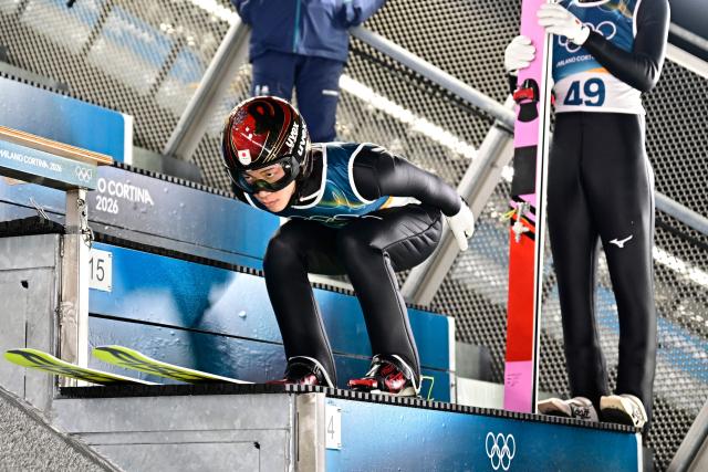 Japan's Ren Nikaido prepares for a jump during the men's ski jumping normal hill individual trial round of the Milano Cortina 2026 Winter Olympic Games at Predazzo Ski Jumping Stadium in Predazzo (Val di Fiemme), on February 9, 2026. (Photo by Tobias SCHWARZ / AFP)